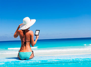 nuevo kindle paperwhite, mujer leyendo en la playa